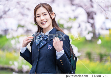 A high school girl commuting to school during the new semester 118881289