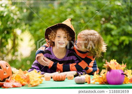 Family decorating home. Halloween arts and crafts. 118881659