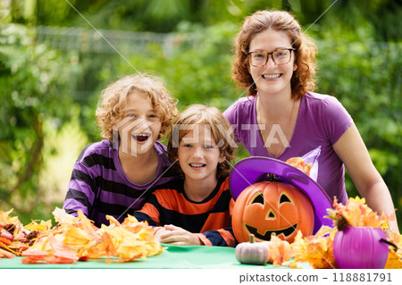 Family decorating home. Halloween arts and crafts. Family decorating home. Halloween arts and crafts. 118881791