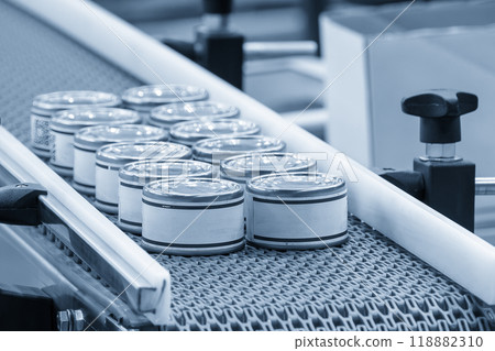 The high technology material handling process in canned food production by roller conveyor. The high technology material handling process in canned food production by roller conveyor. 118882310