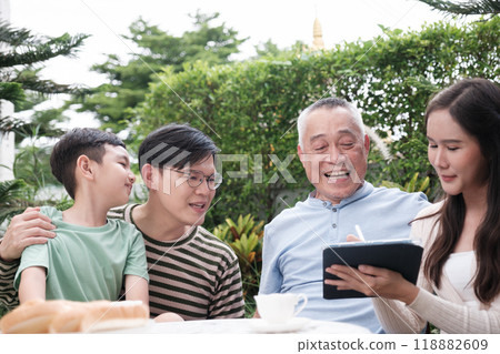 Happy Asian Family enjoy spending time in the garden Happy Asian Family enjoy spending time in the garden 118882609