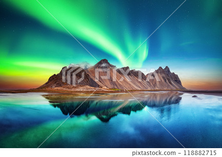 Aurora borealis Northern lights over famous Stokksnes mountains Aurora borealis Northern lights over famous Stokksnes mountains 118882715