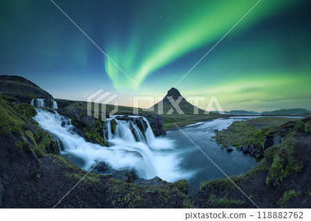 Panoramic view on Kirkjufellsfoss waterfall under incredible sky Panoramic view on Kirkjufellsfoss waterfall under incredible sky 118882762