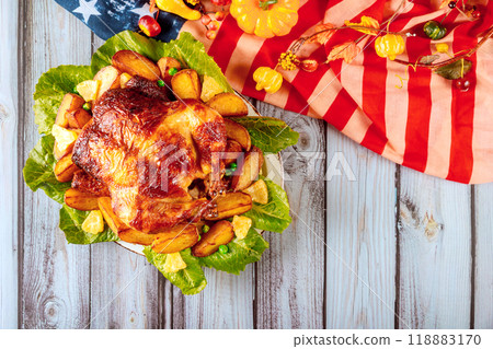 Baked chicken on table during Thanksgiving Day celebration at America 118883170