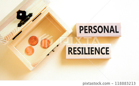 Personal resilience symbol. Concept word Personal resilience on wooden blocks. Beautiful white background. Wooden chest with coins. Business psychological personal resilience concept. Copy space. Personal resilience symbol. Concept word Personal resilience on wooden blocks. Beautiful white background. Wooden chest with coins. Business psychological personal resilience concept. Copy space. 118883213