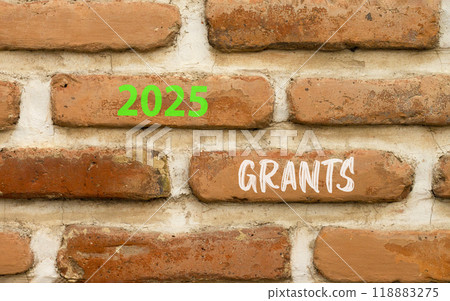Planning 2025 grants new year symbol. Concept words 2025 Grants on beautiful brown brick wall. Beautiful brown brick wall background. Business 2025 grants new year concept. Copy space. 118883275
