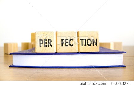 Perfection symbol. Concept word Perfection on beautiful wooden blocks. Beautiful wooden table white background. Beautiful book. Business perfection concept. Copy space. Perfection symbol. Concept word Perfection on beautiful wooden blocks. Beautiful wooden table white background. Beautiful book. Business perfection concept. Copy space. 118883281