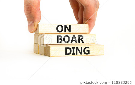 Onboarding success symbol. Concept word Onboarding on wooden blocks. Businessman hand. Beautiful white background. Business onboarding success concept. Copy space. 118883295