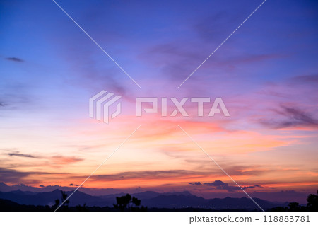 Evening time of panorama mountain under dramatic twilight sky and cloud. Nightfall Silhouette mountain on sunset. 118883781