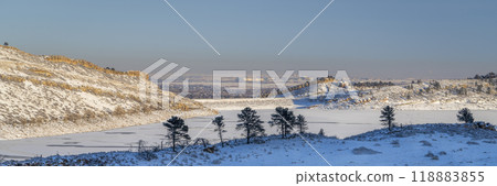winter scenery panorama  in foothills of Rocky Mountains in northern Colorado with frozen Horsetooth Reservoir 118883855