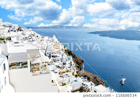 Fira, Santorini (Thira), views of the white houses with their cobbled streets. Village bathed by the South Aegean Sea, in the Cyclades, Greece Fira, Santorini (Thira), views of the white houses with their cobbled streets. Village bathed by the South Aegean Sea, in the Cyclades, Greece 118886534