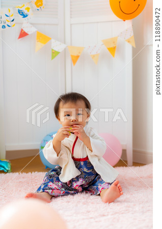 Boy wearing hakama celebrating his first birthday, 1 year old Boy wearing hakama celebrating his first birthday, 1 year old 118890472