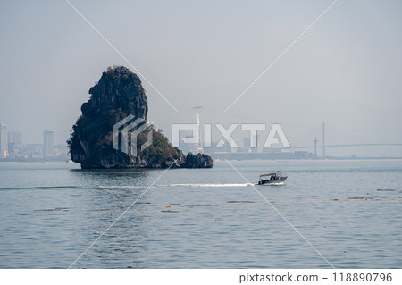 Boat in Halong bay, Vietnam. Halong Bay is a famou Boat in Halong bay, Vietnam. Halong Bay is a famou 118890796