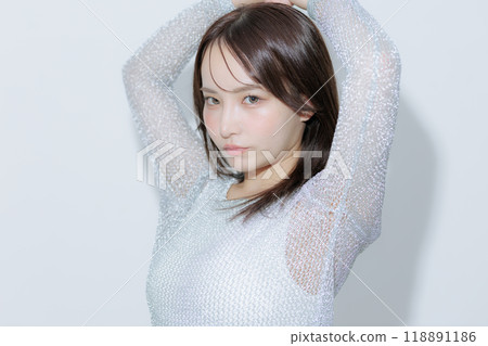 Young woman with Korean style makeup and clothes Young woman with Korean style makeup and clothes 118891186