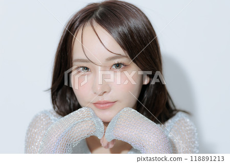 Young woman with Korean style makeup and clothes Young woman with Korean style makeup and clothes 118891213