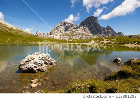 View of rocky summits of Sexten Dolomites and mountain lakes Laghi dei Piani 118891292