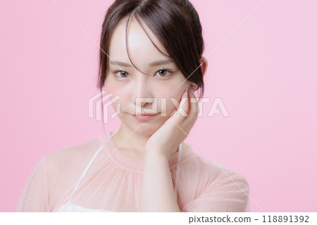 Young woman with Korean make-up Young woman with Korean make-up 118891392