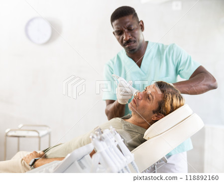 cosmetic surgeon expertly performed 118892160