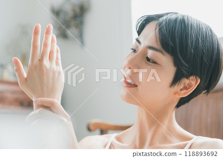 Young woman's hand care 118893692