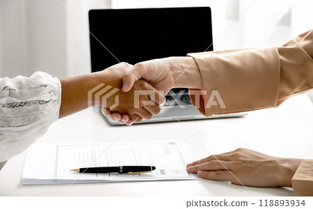 Handshake after business officer executives interview job applicants employee in the meeting room Handshake after business officer executives interview job applicants employee in the meeting room 118893934