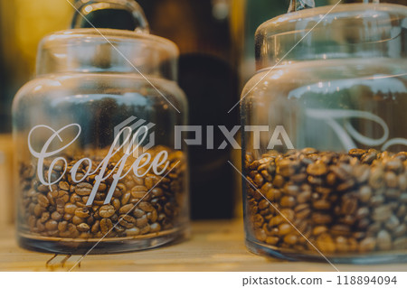 Coffee beans in a glass jar Coffee beans in a glass jar 118894094