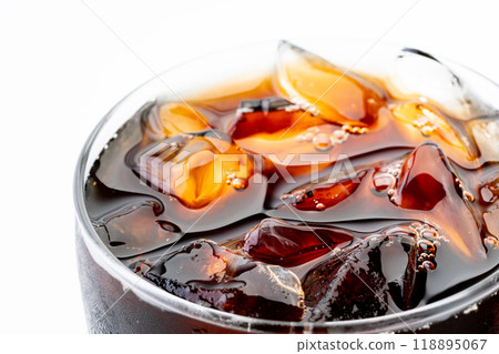 Close-up of iced coffee in a glass Close-up of iced coffee in a glass 118895067