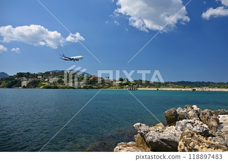 Airports by the sea and aircraft landing over water. Aircraft tracking point. Corfu Island Greece. Concept for holidays, travel and transportation by plane. Airports by the sea and aircraft landing over water. Aircraft tracking point. Corfu Island Greece. Concept for holidays, travel and transportation by plane. 118897483