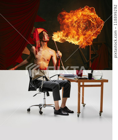 Fire breather and businessman. Creative collage. Top half features circus performer breathing fire, while lower half is businessman at desk. 118899292