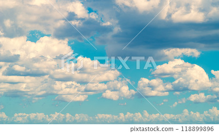 Lots of white clouds Late summer to early autumn blue sky and cumulus clouds 16:9 c-3 Warm colors Lots of white clouds Late summer to early autumn blue sky and cumulus clouds 16:9 c-3 Warm colors 118899896