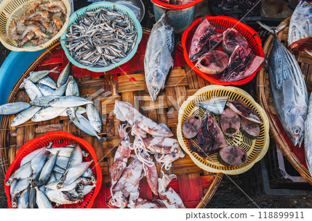 assortment of sea fish and seafood on counter in the fish market in Asia in Vietnam 118899911