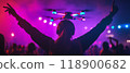 Person enjoying a drone show at night 118900682