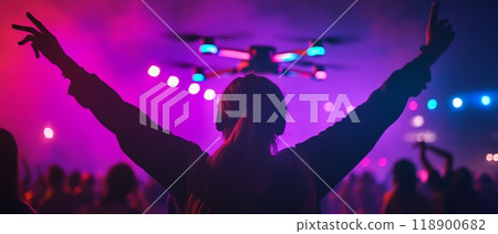 Person enjoying a drone show at night 118900682