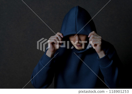 Man wearing a hoodie Man wearing a hoodie 118901253