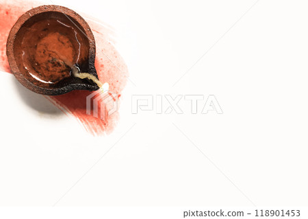 Top View of Clay Diya Lamp with Paint Stroke for Diwali Festivities 118901453
