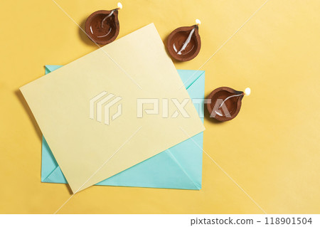 Festive Diwali greeting card with traditional clay lamps. Top view 118901504