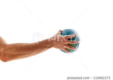 Male muscular hand holding handball ball isolated on white background. Powerful throw Male muscular hand holding handball ball isolated on white background. Powerful throw 118902273