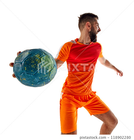 Dynamic image of young bearded man in orange uniform, handball player in motion, playing, training isolated on white background Dynamic image of young bearded man in orange uniform, handball player in motion, playing, training isolated on white background 118902280