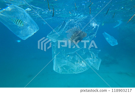 plastic trash floating in the sea 118903217