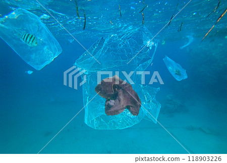 plastic trash floating in the sea 118903226