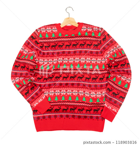 Christmas jumper with hanger lay on white background Christmas jumper with hanger lay on white background 118903816