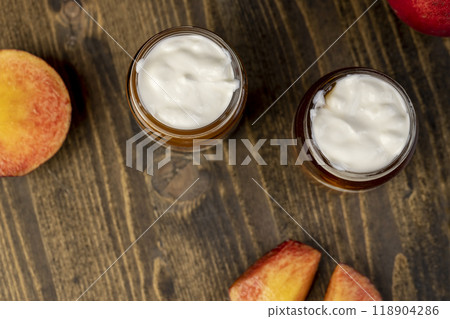 fresh yogurt with jam and pieces of ripe nectarine fresh yogurt with jam and pieces of ripe nectarine 118904286