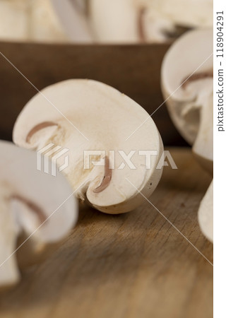 fresh, not cooked mushrooms, white champignons fresh, not cooked mushrooms, white champignons 118904291