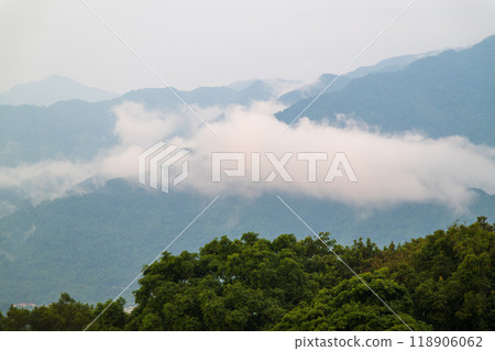 Clouds Drifting Over Lush Green Hills. Clouds Drifting Over Lush Green Hills. 118906062