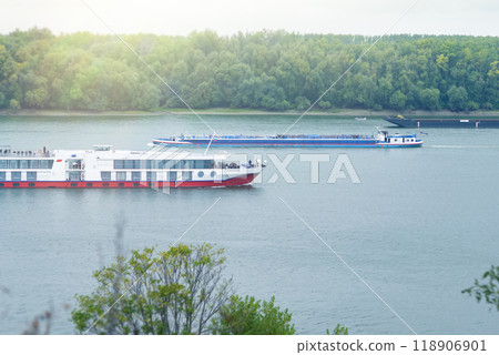 Ships on the Danube River with Scenic Forested Background 118906901