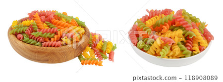 raw Fusilli in wooden and ceramic bowl colored pasta, isolated on white background with full depth of field raw Fusilli in wooden and ceramic bowl colored pasta, isolated on white background with full depth of field 118908089