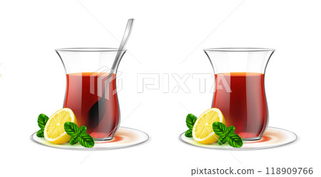Turkish transparent tea cup with black tea, silver spoon, mint and lemon 118909766