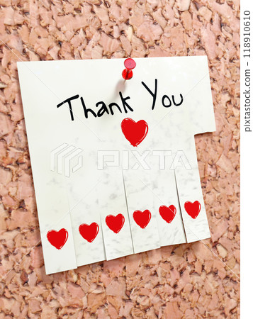 Thank You note pinned to a corkboard Thank You note pinned to a corkboard 118910610