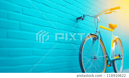 Brightly colored bicycle leaning against a blue brick wall 118910622