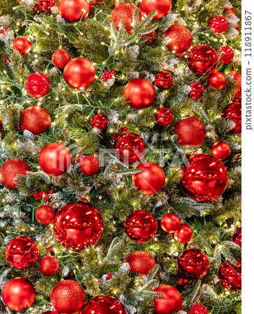 Background of a Christmas tree decorated with lights and decorations. Holiday background concept  Background of a Christmas tree decorated with lights and decorations. Holiday background concept  118911867