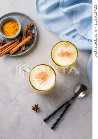 Turmeric golden milk latte with spices and honey. Detox, immunity boosting, anti-inflammatory drink 118912422
